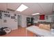 Basement with painted walls, and an entertainment area with a TV and decor, set on wood floors at 324 Madeline Way, Temple, GA 30179