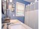 Full bathroom featuring a double vanity with modern fixtures and a shower with curtain at 324 Madeline Way, Temple, GA 30179
