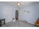 Bedroom with double closets, carpet, and two doors and a neutral color scheme at 324 Madeline Way, Temple, GA 30179