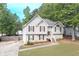 Inviting two-story home with a well-maintained lawn, driveway, and charming exterior at 324 Madeline Way, Temple, GA 30179