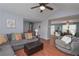 Inviting living room with comfortable seating and seamless flow into the dining area at 324 Madeline Way, Temple, GA 30179