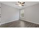 Bedroom with luxury vinyl flooring, a ceiling fan and a double hung window at 7074 Ravenwood Ln, Lithonia, GA 30038