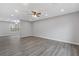Open-concept living room with recessed lighting and luxury vinyl plank flooring at 7074 Ravenwood Ln, Lithonia, GA 30038