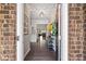 Inviting foyer with dark hardwood floors and a view into the home's open-concept living spaces at 123 Woodford Ln, Canton, GA 30115