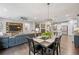 Open-concept layout showcasing the living room, dining area, and kitchen, perfect for entertaining at 123 Woodford Ln, Canton, GA 30115