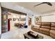 Game room with dining area, barn door, ceiling fan, and comfortable seating at 164 Inwood Walk, Woodstock, GA 30188