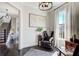 Bright home office featuring hardwood floors, natural light, and modern decor at 164 Inwood Walk, Woodstock, GA 30188