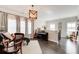 Cozy living room with hardwood floors, piano, and natural light at 164 Inwood Walk, Woodstock, GA 30188