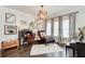 Comfortable living room area featuring a chaise lounge, piano and hardwood floors at 164 Inwood Walk, Woodstock, GA 30188