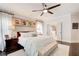 Bright main bedroom featuring hardwood floors and an attached bathroom at 164 Inwood Walk, Woodstock, GA 30188
