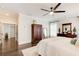 Spacious main bedroom with hardwood floors and an ensuite bathroom at 164 Inwood Walk, Woodstock, GA 30188