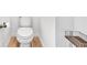 Small, toilet room features toilet, toilet paper, and decor at 3501 Great Sky Pkwy, Canton, GA 30114