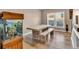 Dining room featuring wood-look floors and table with a unique fish tank adding character to the space at 3501 Great Sky Pkwy, Canton, GA 30114