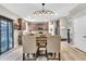 Open-concept design showcasing the kitchen with stainless steel appliances and dining area at 3501 Great Sky Pkwy, Canton, GA 30114