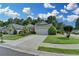 Charming home with a manicured front yard and a two-car garage provides classic curb appeal at 4485 Cadmium Dr, Cumming, GA 30040