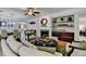 Inviting living room connects to the dining area, featuring a fireplace and open layout at 4485 Cadmium Dr, Cumming, GA 30040