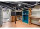 Basement featuring built-in shelves and desk area, offering extra storage or functional workspace at 490 E Pharr Rd, Decatur, GA 30030