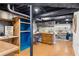 Finished basement area with wood floors, built-in shelving and desk; great potential extra living space at 490 E Pharr Rd, Decatur, GA 30030