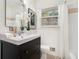 Bathroom with subway tile and a dark vanity at 490 E Pharr Rd, Decatur, GA 30030