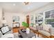 Bright living room with hardwood floors, natural light, and stylish furniture at 490 E Pharr Rd, Decatur, GA 30030