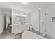 Bright primary bath with soaker tub, glass enclosed shower and dual vanity at 800 Breckinridge Sw Rd, Marietta, GA 30064