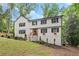 Charming two-story home featuring a white painted brick foundation and a welcoming front yard at 800 Breckinridge Sw Rd, Marietta, GA 30064
