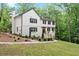 A charming, two-story home featuring a white painted brick foundation and landscaped front yard at 800 Breckinridge Sw Rd, Marietta, GA 30064