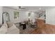 Open-concept living room featuring hardwood floors, natural light, and comfortable seating at 800 Breckinridge Sw Rd, Marietta, GA 30064