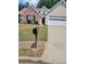 Well-kept lawn and mailbox with home address number at 1150 Hillary Ln, Lawrenceville, GA 30043