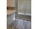 Bright breakfast nook area featuring modern flooring, countertops, and natural light from a window at 1150 Hillary Ln, Lawrenceville, GA 30043