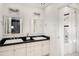 Elegant bathroom with dual sinks, granite countertops, and a shower/tub combo at 1928 Main Nw St, Atlanta, GA 30318