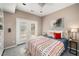Cozy bedroom with french doors, plush carpet, and stylish decor at 1928 Main Nw St, Atlanta, GA 30318