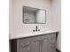 Bathroom featuring a gray vanity and a framed mirror above the sink at 2091 Parker Ranch Se Rd, Atlanta, GA 30316