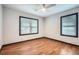 Bedroom showcasing two windows offering abundant natural light and hardwood flooring at 2091 Parker Ranch Se Rd, Atlanta, GA 30316