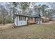 The property showcases a well-manicured lawn and inviting outdoor space at 2091 Parker Ranch Se Rd, Atlanta, GA 30316