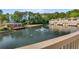 Picturesque community lake with water fountain and resident club house at 27 Lakes Edge Se Dr, Smyrna, GA 30080