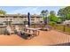 Deck with seating for community members overlooking a scenic pond at 27 Lakes Edge Se Dr, Smyrna, GA 30080