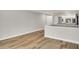 Hallway interior featuring wood floors, with wall and doorway in background at 27 Lakes Edge Se Dr, Smyrna, GA 30080