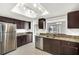 Spacious kitchen featuring stainless steel appliances and granite countertops at 27 Lakes Edge Se Dr, Smyrna, GA 30080