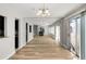 Spacious living area featuring wood floors and modern design at 27 Lakes Edge Se Dr, Smyrna, GA 30080
