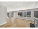Bright open living space with fireplace and large windows for natural light at 27 Lakes Edge Se Dr, Smyrna, GA 30080