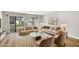 Modern living room with stylish furniture, a rug, and a sliding door to outside at 27 Lakes Edge Se Dr, Smyrna, GA 30080