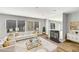 Bright living room with modern decor, fireplace, and large windows allowing ample natural light at 27 Lakes Edge Se Dr, Smyrna, GA 30080