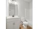 Bathroom with tub/shower combo and single sink vanity at 3301 Lions Ruby Ln, Atlanta, GA 30349