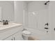 Bathroom featuring a single sink vanity and tub with shower at 3301 Lions Ruby Ln, Atlanta, GA 30349