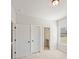 Bedroom featuring double door closet and adjacent office space at 3301 Lions Ruby Ln, Atlanta, GA 30349
