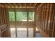 View of the interior construction of a two-story home with framed-in windows at 3301 Lions Ruby Ln, Atlanta, GA 30349