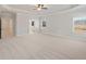 Spacious main bedroom featuring a tray ceiling and neutral carpet at 3301 Lions Ruby Ln, Atlanta, GA 30349