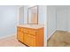 Bathroom featuring wood vanity, tile floors, neutral walls and traditional style at 557 Lawton Sw St, Atlanta, GA 30310