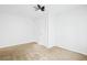 Bedroom with neutral walls, carpet flooring, and double closets at 557 Lawton Sw St, Atlanta, GA 30310